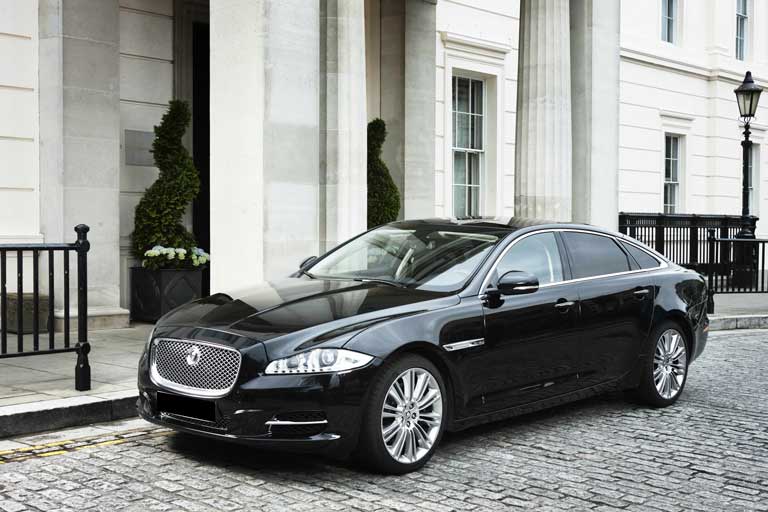 Jaguar XJL Outside Residential Building with Tall Columns